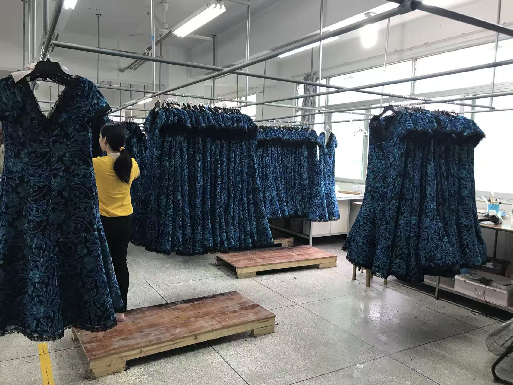Evening dresses in production finishing
